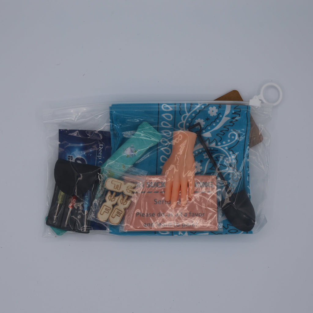 Collection of small items including a blue bag, a keychain, and a card