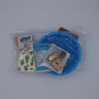 Assorted items including a blue bag and packets